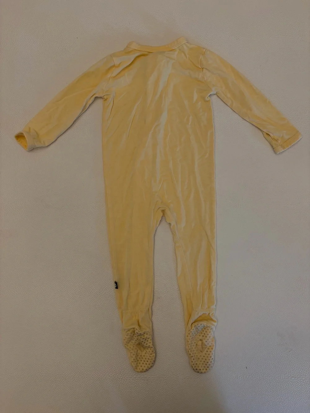 Kyte Baby Footie Zipper Pajamas TRIO. Purple, Peach Print, Yellow. 6-12mo